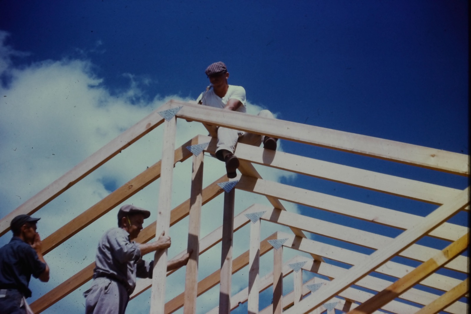 Grandfather up in the rafters during construction, 1963
